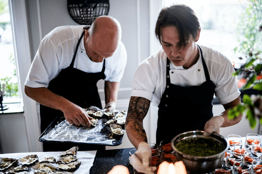 two chefs cooking for a restaurant