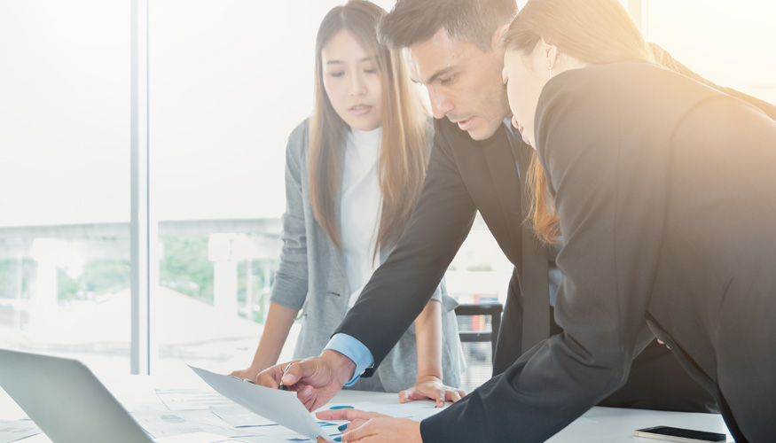 Business Team concept ,Business people brainstorm or discussing the document or finance report charts and graphs on office desk