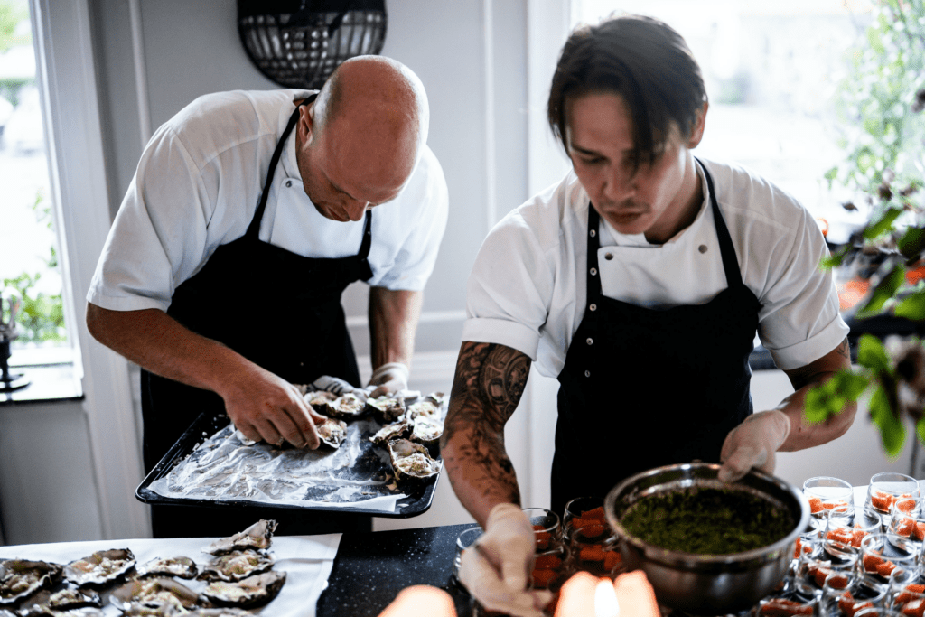 two chefs cooking for a restaurant