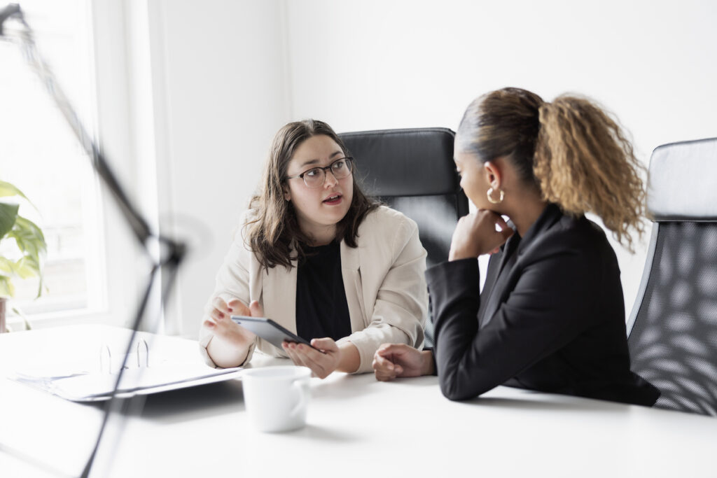 Business women chatting.